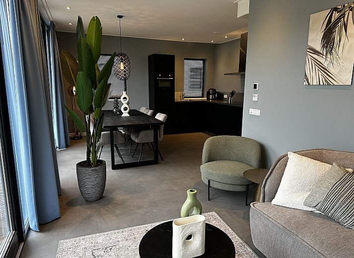 Chalet in Lochem with modern wooden exterior, located in the rustic Achterhoek, Gelderland.