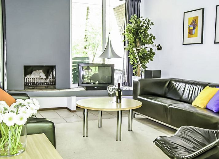 Vakantiehuis 4L in Lochem, Achterhoek, Gelderland omgeven door weelderige natuur en bomen voor een serene vakantie-ervaring.