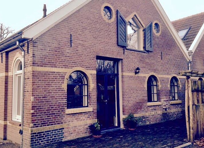 Huisje in Lochem, vakantiehuis in de Achterhoek, Gelderland, omgeven door een prachtige tuin en bosrijke omgeving.