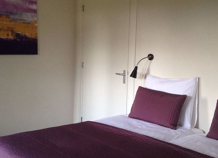 Huisje in Lochem, een charmant vakantiehuis in de Achterhoek, Gelderland, met authentieke bakstenen gevel en landelijke uitstraling.