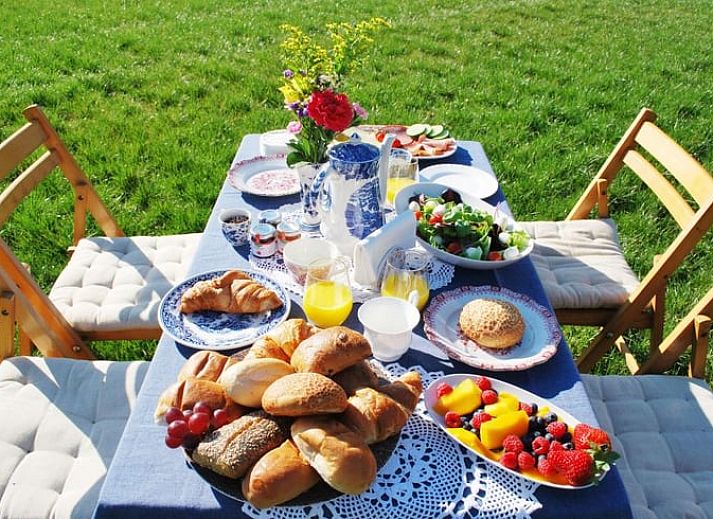 Sfeervol winterlandschap bij Huisje in Lochem, vakantiehuis in de besneeuwde natuur van de Achterhoek, Gelderland.