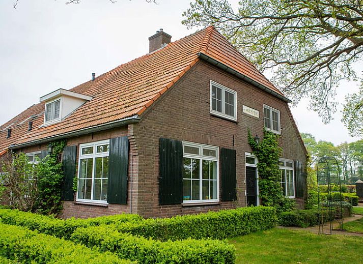 Charmant vakantiehuis in Lochem, Achterhoek, omgeven door groene natuur en rustieke architectuur in Gelderland.