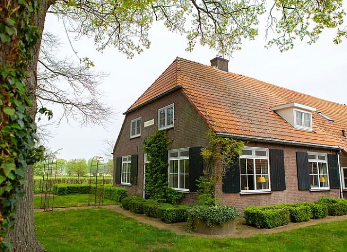 Charmant vakantiehuis in Lochem, Achterhoek, omgeven door groene natuur en rustieke architectuur in Gelderland.