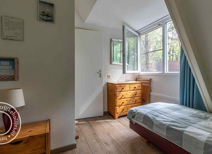 Terrasse des Ferienhauses in Harfsen mit Blick auf die gruene Umgebung, Achterhoek, Gelderland.