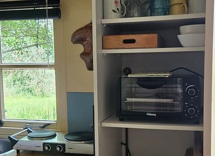 Entspannen Sie sich im Whirlpool im Ferienhaus in Harfsen, das in der gruenen Natur von Achterhoek, Gelderland, liegt.