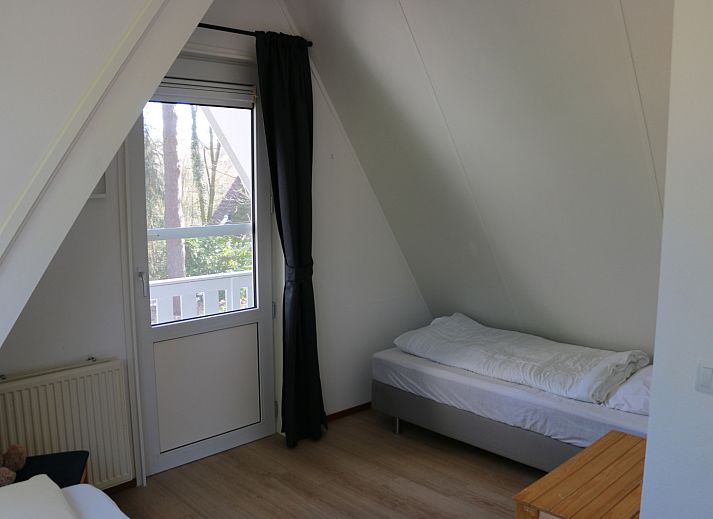 Schlafzimmer mit Einzelbett im Ferienhaus DG1709, Harfsen.