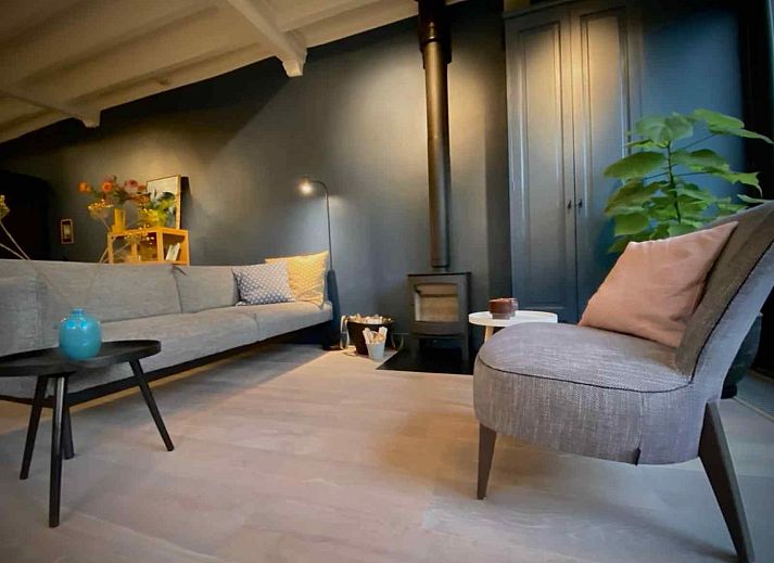 Wood supply next to the stove in vacation home DG1292 in Doesburg, Achterhoek, for cozy evenings.