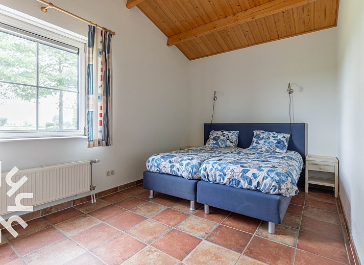 View of vast fields from DG025 vacation home in Gelderland.