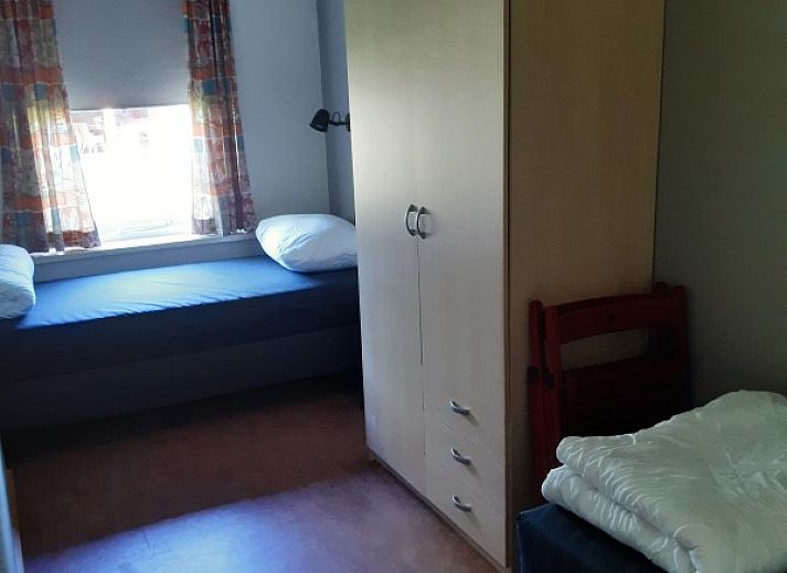 Gezellige woonkamer van Meyboske 2 vakantiehuis in Silvolde, Achterhoek met comfortabele zithoek en televisie.