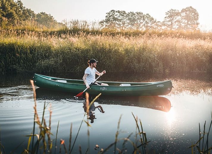 Gemuetlicher Innenraum mit Weltkarte im Ferienhaus in Haarlo, ideal fuer einen Aufenthalt in Achterhoek, Gelderland.