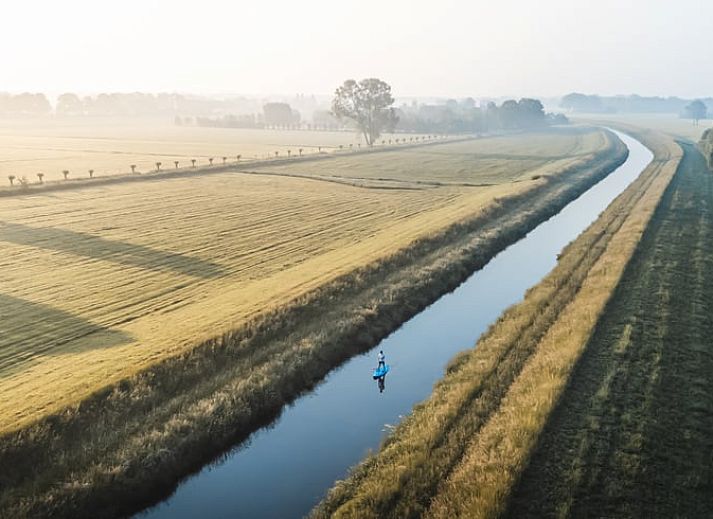 Sterrenhemel boven kampvuur bij Vakantiehuisje in Haarlo, Achterhoek, Gelderland voor een magische avond.