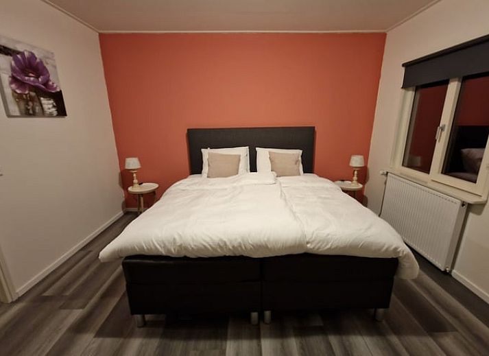 Gezellige woonkamer in Vakantiehuisje in Wichmond, Achterhoek, met comfortabele zithoek en stijlvolle inrichting.