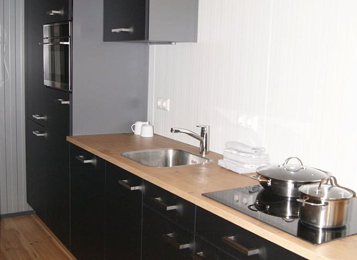 Outdoor terrace of cottage in Zutphen, Gelderland, surrounded by nature.