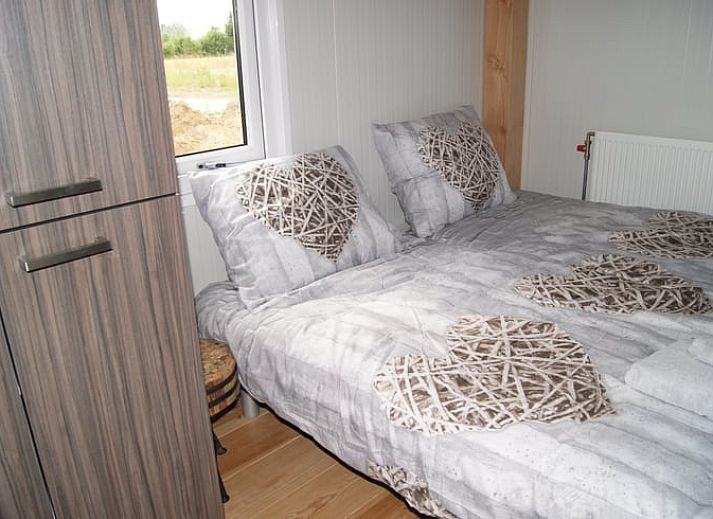 Outdoor terrace of cottage in Zutphen, Gelderland, surrounded by nature.