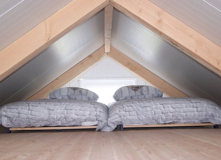 Stylish dining room in Holiday home in Zutphen, Gelderland, with wooden interior.