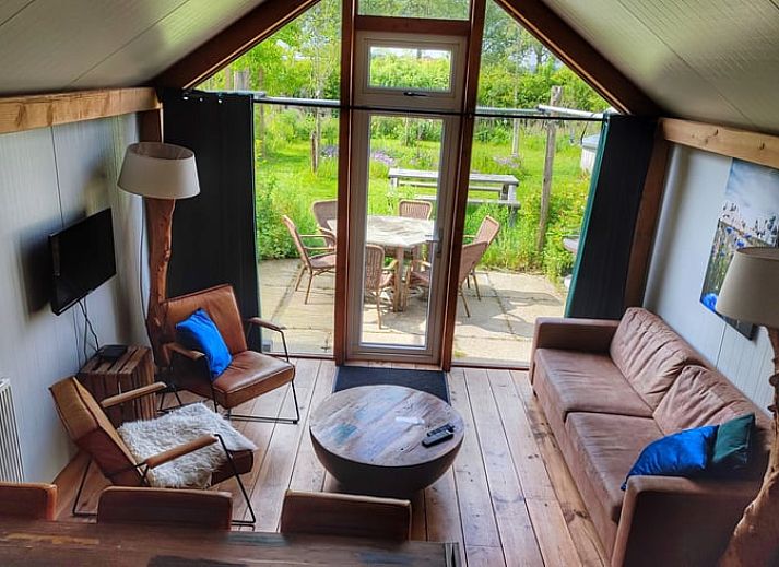 Cozy terrace at Holiday home in Zutphen, surrounded by green nature in Achterhoek, Gelderland.