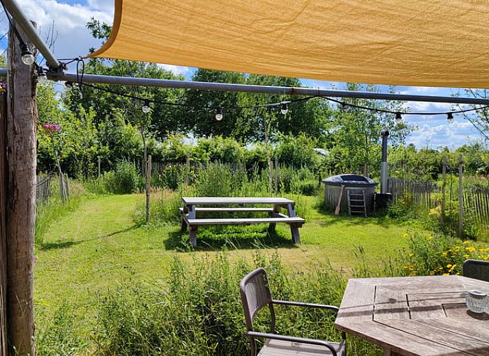 Comfortable living room in Holiday home in Zutphen overlooking the garden, Achterhoek, Gelderland.
