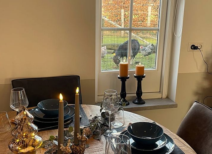 Holiday home in Geesteren, located in the picturesque Achterhoek region of Gelderland, with a charming exterior and inviting terrace.