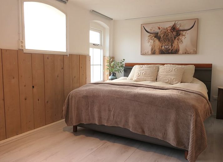 Holiday home in Geesteren, located in the picturesque Achterhoek region of Gelderland, with a charming exterior and inviting terrace.