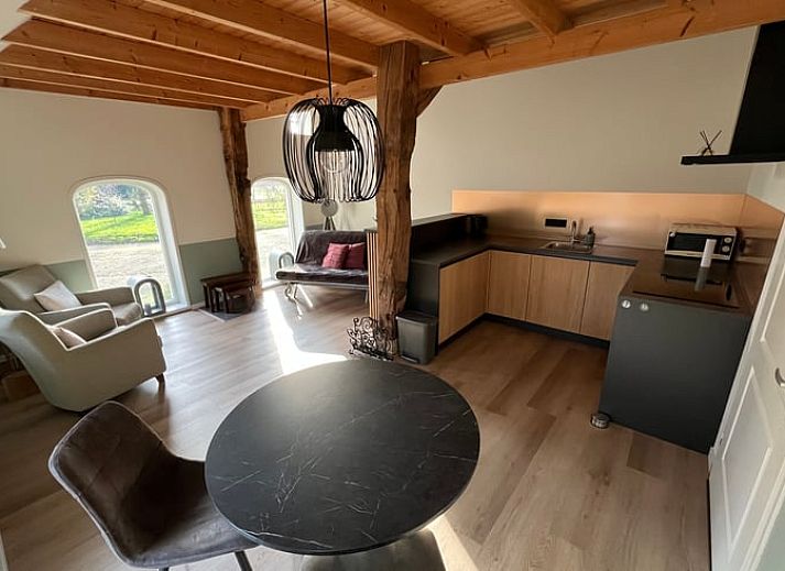 Charmantes Ferienhaus in Geesteren, Achterhoek, Gelderland, mit authentischer Backsteinfassade und laendlicher Umgebung.