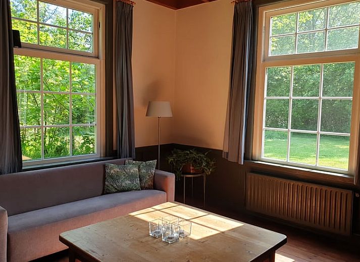 Enjoy the charming outdoor space at Holiday Home in Vorden, Achterhoek, Gelderland, perfect for relaxing in nature.