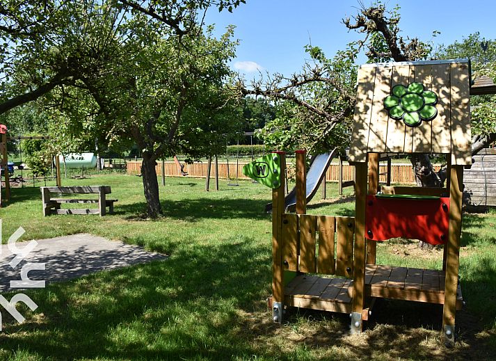 Vacation home DG127C in Vorden, Achterhoek with spacious garden and seating area.