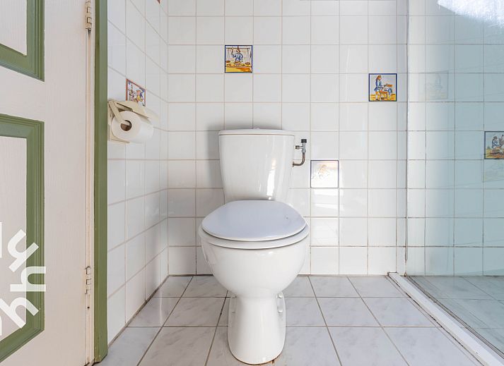 Cozy interior of vacation home DG496 in Vorden, Achterhoek, with wooden interior.