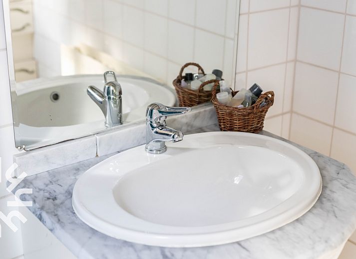 Cozy interior of vacation home DG496 in Vorden, Achterhoek, with wooden interior.