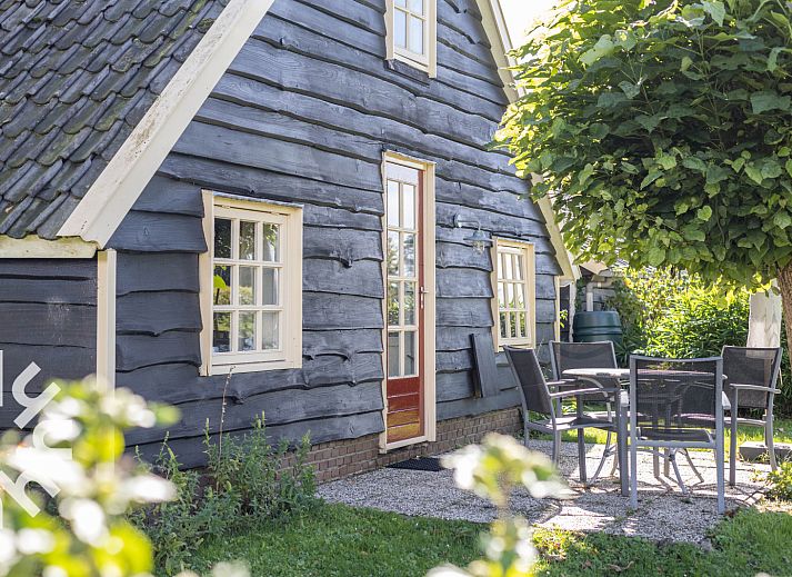 Cozy interior of vacation home DG496 in Vorden, Achterhoek, with wooden interior.
