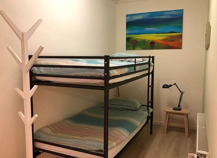 Ferienhaus in Doetinchem mit Reetdach, umgeben von einem gruenen Garten in der Region Achterhoek, Gelderland, ideal fuer einen entspannten Aufenthalt.