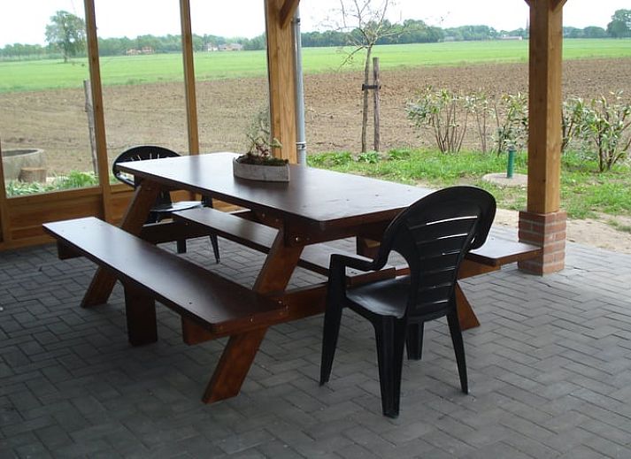 Cottage in Beltrum, Ferienhaus in Achterhoek, Gelderland mit charmanter Backsteinfassade und gruenem Garten.