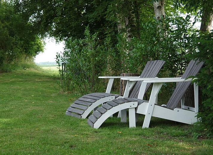 Rustieke slaapruimte in Vakantiehuisje in Neede met uitzicht op de natuur, Gelderland.