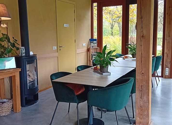 Atmospheric evening at Holiday home in Gaanderen, Achterhoek, Gelderland with illuminated porch.