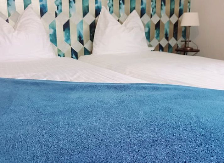 Sunny terrace of Holiday home in Gaanderen, overlooking the nature of Achterhoek, Gelderland.