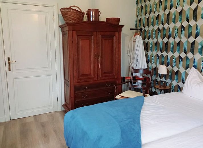 Sunny terrace of Holiday home in Gaanderen, overlooking the nature of Achterhoek, Gelderland.