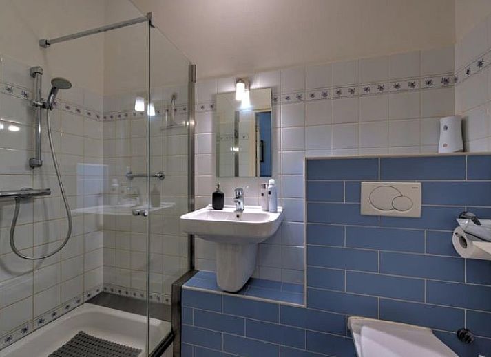 Cozy dining area in Holiday home in Gaanderen, Achterhoek, Gelderland with wood stove.