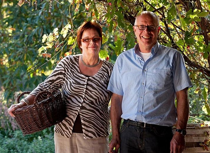 Cozy dining area in Holiday home in Gaanderen, Achterhoek, Gelderland with wood stove.
