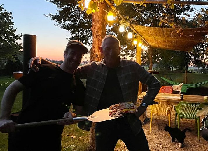 Cozy indoor area of Holiday Home in Lievelde, Achterhoek, Gelderland with comfortable seating area and warm atmosphere.