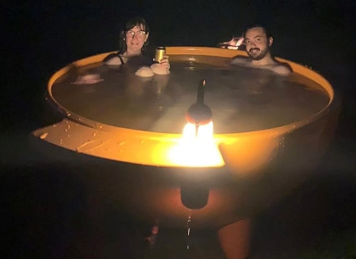 Cozy indoor area of Holiday Home in Lievelde, Achterhoek, Gelderland with comfortable seating area and warm atmosphere.