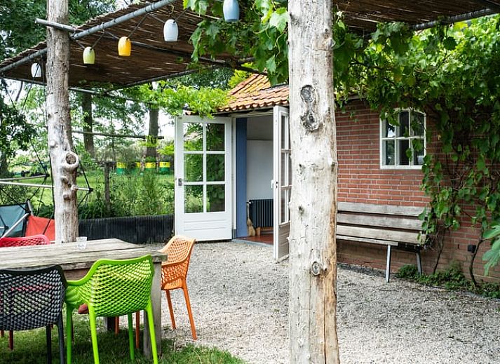 Offene Veranda des Ferienhauses in Lievelde, Achterhoek, Gelderland. Geniessen Sie die Natur und die Ruhe in der gruenen Umgebung.