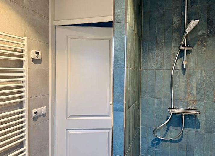 Comfortable deck chairs in the garden of cottage in Lievelde, Achterhoek.