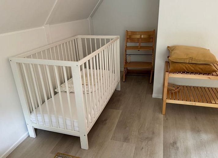 Outdoor terrace of cottage in Lievelde, Achterhoek, surrounded by greenery.