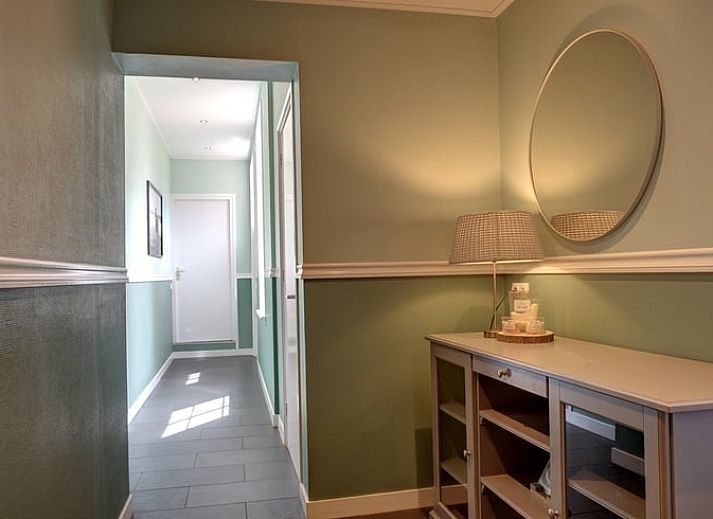 Backyard of Cottage in Winterswijk Kotten, with lush plants and serene atmosphere in Achterhoek, Gelderland.