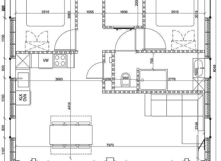 Stilvolles Wohnzimmer in einem freistehenden Haus in Olburgen, Achterhoek, Gelderland, mit moderner Einrichtung und groen Fenstern.