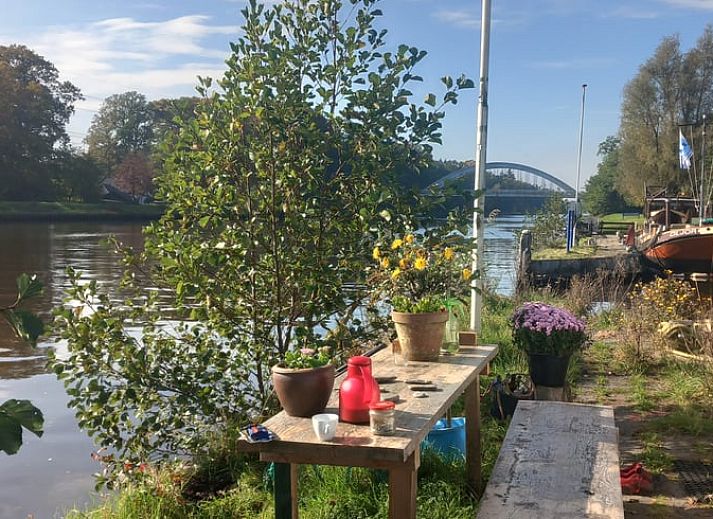 Vakantiehuis in Almen, geniet van de waterkant in de Achterhoek, Gelderland met een schilderachtig uitzicht.