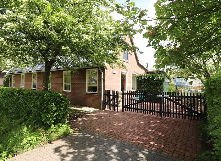 Geniet van de charmante tuin bij Vakantiehuisje in Winterswijk Woold, gelegen in de rustige Achterhoek, Gelderland.