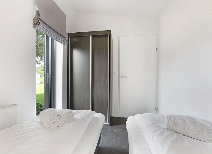 Open living space in De Vlinderhoeve, with dining area and kitchen in Achterhoek, Gelderland.