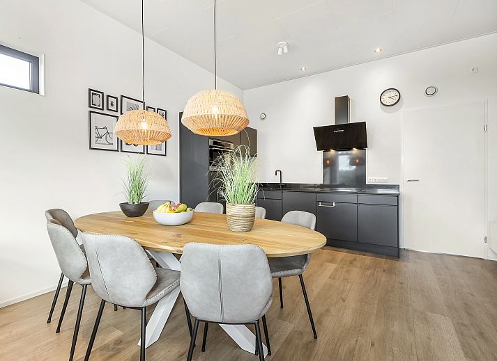 The Butterfly Farm 8-person bungalow in Kring van Dorth with modern architecture and green surroundings.