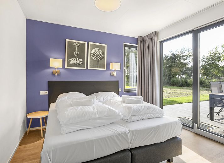 Stylish sitting area in The Butterflyhoeve 8-person house with modern decoration.