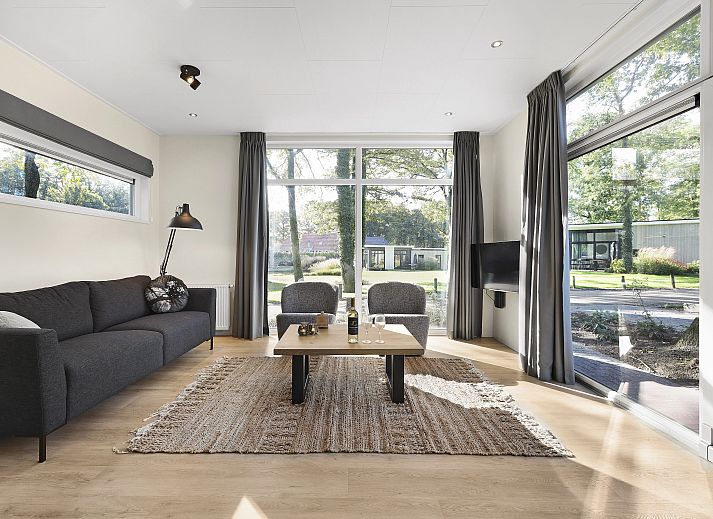 De Vlinderhoeve bungalow in Kring van Dorth met modern terras en groene omgeving in de Achterhoek, Gelderland.